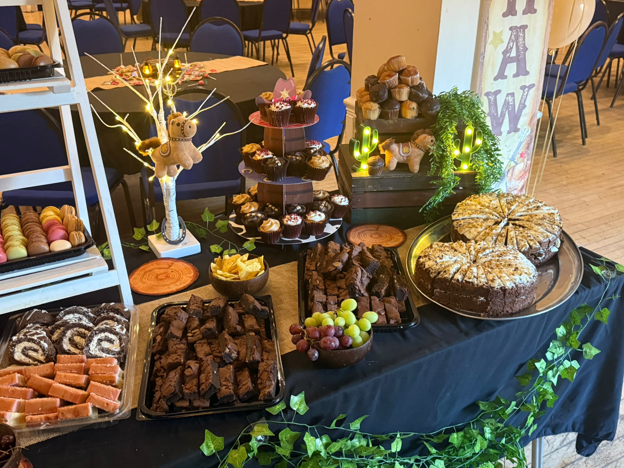 An SJK catered event with an abundant buffet and desserts